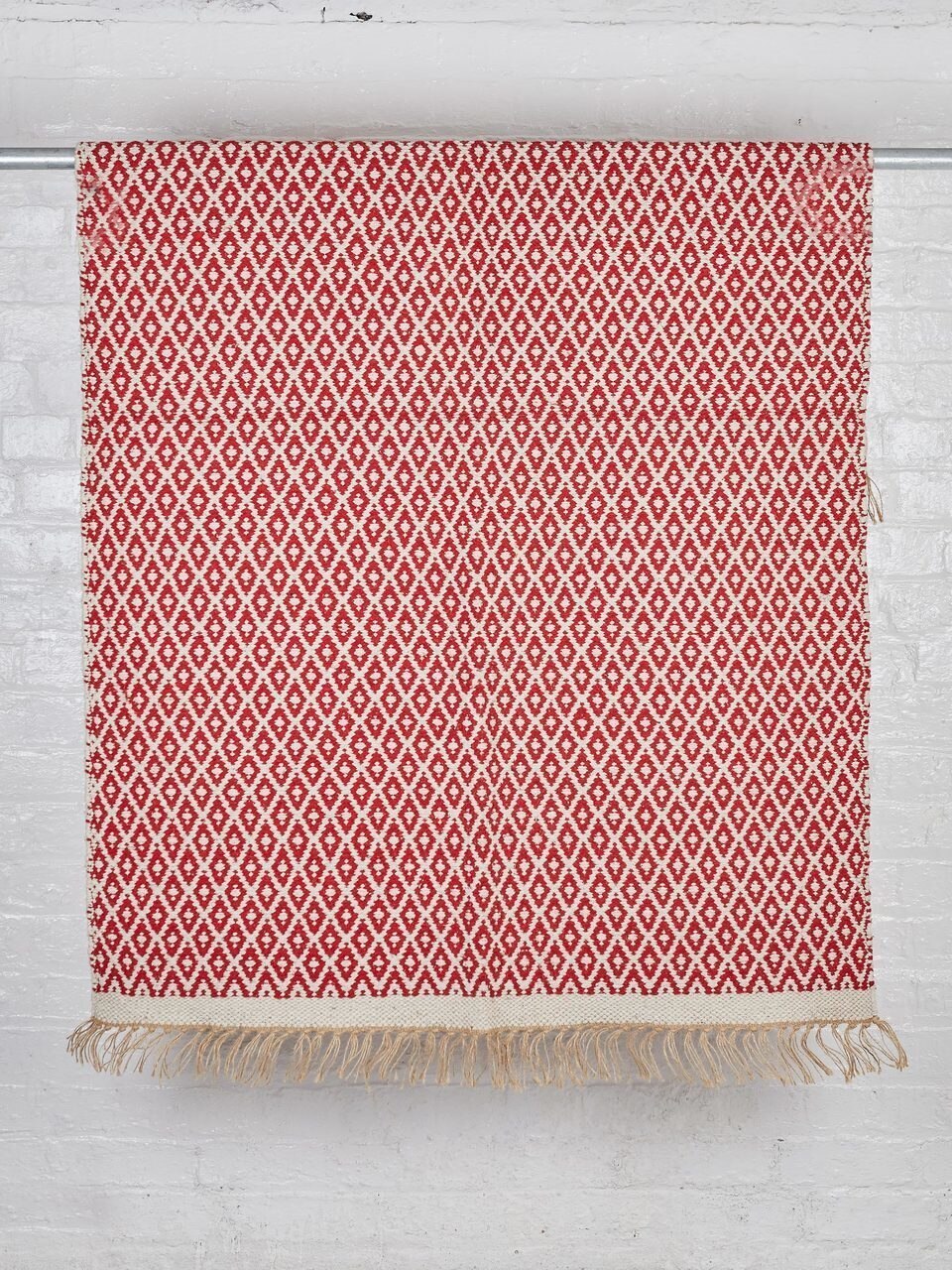 Hand Woven Patterned Rug with Jute and Tassels - 70 x 115cm