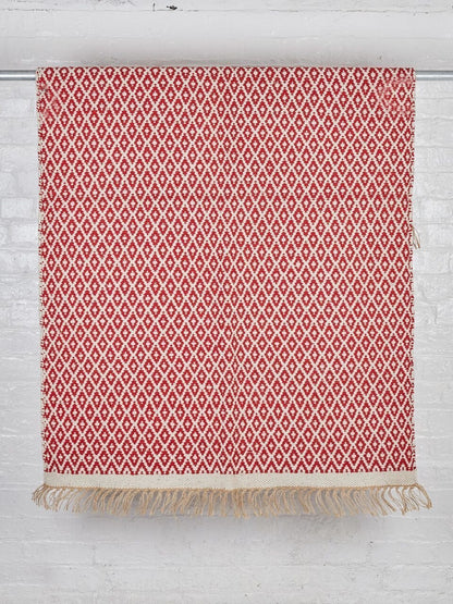 Hand Woven Patterned Rug with Jute and Tassels - 70 x 115cm